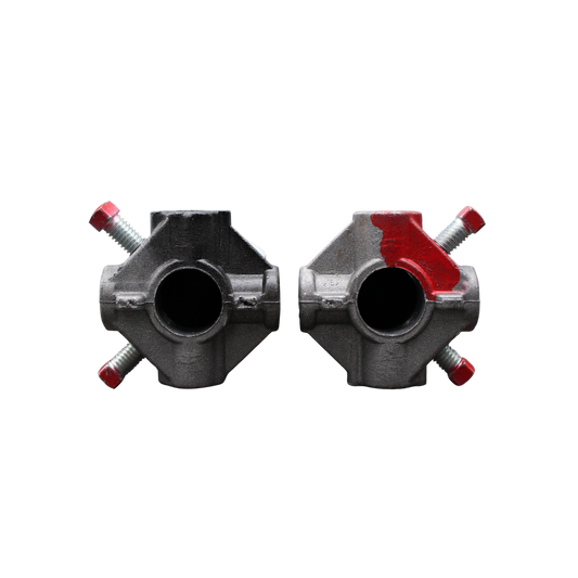Two metal spring cones painted black and red